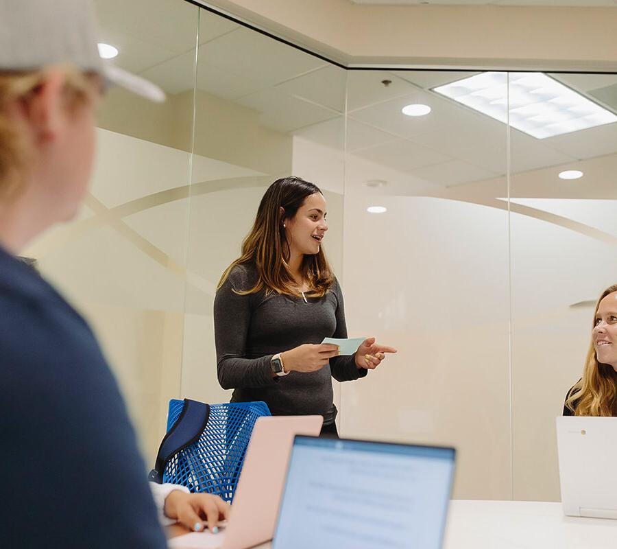 students from the philosophy major study in the library